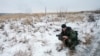 FILE - A pro-Russian separatist from the Chechen "Death" battalion is seen in the self-proclaimed Donetsk People's Republic, eastern Ukraine, Dec. 8, 2014. So far, the U.S. is not seeing any foreign mercenaries supporting Russia's war effort in Ukraine.