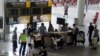 Ruang kedatangan internasional di Bandara Internasional Ngurah Rai, Tuban, dekat Denpasar, Bali, 16 Februari 2022.(SONNY TUMBELAKA / AFP)