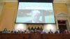 An image of a tweet by former President Donald Trump is displayed at a hearing held by the House select committee investigating the Jan. 6 attack on the US Capitol, June 9, 2022.