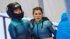FILE - Australia's Breeana Walker and Kiara Reddingius after crashing during the 2-woman bobsleigh in Bobsleigh & Skeleton World Cup, Latvia, Jan. 2, 2022. 