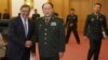 U.S. Defense Secretary Leon Panetta, left, and Chinese Defense Minister Liang Guanglie shake hands before their delegations meet at the Bayi Building in Beijing, China, September 18, 2012.