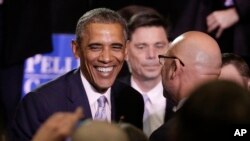President Barack Obama greets audience members after speaking at Pellissippi State Community College in Knoxville, Tenn., Jan. 9, 2015. 