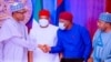 Shugaba Buhari da wasu daga cikin sanatoci yayin da suka yi wata ganawa