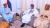 Buhari, (hagu) Tinubu, (tsakiya) da gwamna Masari a dama.