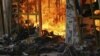 Fire consumes a clothing stall after an explosion at a shopping complex in Nairobi, Kenya, May 28, 2012. (G. Joselow/VOA)