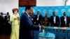 Cameroonian President Paul Biya casts his ballot while his wife Chantal Biya watches at a polling station during the presidential election in Yaounde, Cameroon, Oct. 7, 2018. 