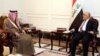 A handout picture released by the Iraqi Prime Minister's press office on February 25, 2017, shows Iraqi Prime Minister Haider al-Abadi (R) meeting with Saudi Foreign Minister Adel al-Jubeir in Baghdad.