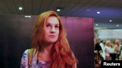 FILE - Russian national Maria Butina is seen at the 2015 FreedomFest conference in Las Vegas, Nevada, July 11, 2015, in a still image taken from a social media video obtained July 19, 2018.