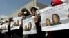 Women hold posters of Frenchwoman, Isabelle Prime (R) and her Yemeni translator Shereen Makawi, during a protest to demand their release, in San'aa, Yemen, March 9, 2015.