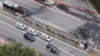 Plane crashes into street in Brazil, killing 2 on board