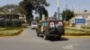 Bodies of Kenyan soldiers are transported by ambulances as they arrive at Wilson airport, Nairobi Kenya, Jan 27, 2017. A spokesman for extremist group al-Shabab says its fighters have killed at least 51 Kenyan soldiers in an attack on an army base in Kulb