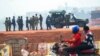 FILE - Security forces gather on election day in Kampala, Uganda, Jan. 14, 2021. Authorities in Uganda recently suspended 54 aid groups, but those groups say they are being targeted for political reasons.