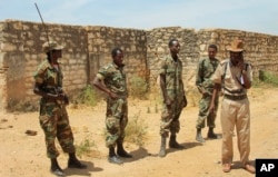 FILE - Ethiopian soldiers patrol in Baidoa, Somalia, Feb. 29, 2012. Both Ethiopia and Kenya have had troops in Somalia for years as part of an African Union mission mandate to fight al-Shabab.