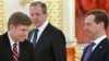 Russian President Dmitry Medvedev (R) stands with Foreign Minister Sergei Lavrov (C) and new American Ambassador Michael McFaul during an official ceremony to present his diplomatic credentials in Moscow's Kremlin, February 22, 2012