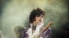 Prince saat menggelar konser di California tahun 1985 (Foto: Heung Shing/Associated Press)