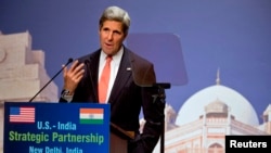 U.S. Secretary of State John Kerry speaks about climate change at the India Habitat Center in New Delhi, June 23, 2013.