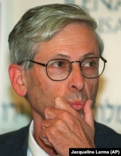 Binyamin Zeev "Benny" Begin, son of former Israeli Prime Minister Menachem Begin, listens to questions during a press conference in Jerusalem, Sunday May 16, 1999