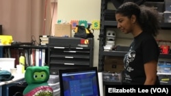 University of Southern California computer science intelligent robotics program student Kristin Jordan provides a demonstration of KIWI, a social companion robot to help children with autism spectrum disorder.