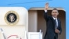 FILE - President Barack Obama waves as he boards Air Force One at Andrews Air Force Base in Maryland en route to Southeast Asia, November 17, 2012.