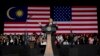 President Barack Obama gestures as he speaks during a town hall meeting at Malaya University in Kuala Lumpur, Malaysia, Sunday, April 27, 2014. 