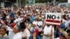 L’opposant Guaido regagne Caracas et appelle à la mobilisation