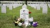 The grave of Army Captain Humayun Khan is seen adorned with flowers at Arlington National Cemetery in Arlington, Virginia, Aug. 1, 2016. 