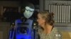 A humanoid robot plays the male companion of a woman with Alzheimer’s disease. 