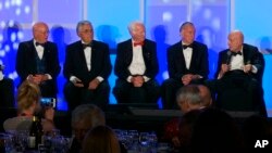 Former Johnson Space Center Director Gerry Griffin, left, a flight director for all of the crewed Apollo missions, sits next to Apollo astronauts Harrison Schmitt, Rusty Schweickart, Walt Cunningham and Tom Stafford, from second from left, during a panel discussion at the Apollo Celebration Gala at the Kennedy Space Center in Cape Canaveral, Fla., July 21, 2018.