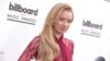 Iggy Azalea arrives at the Billboard Music Awards at the MGM Grand Garden Arena, May 18, 2014, in Las Vegas.