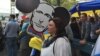 Caricature of Vladimir Putin put up by those protesting his invasion of Ukraine (VOA photo - C. Presutti).