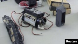 An Improvised Explosive Device (IED) used by the Taliban is displayed during a lesson on identifying IEDs for Afghan policemen conducted by U.S. army soldiers at Camp Nathan Smith in Kandahar, southern Afghanistan, October 15, 2012. 