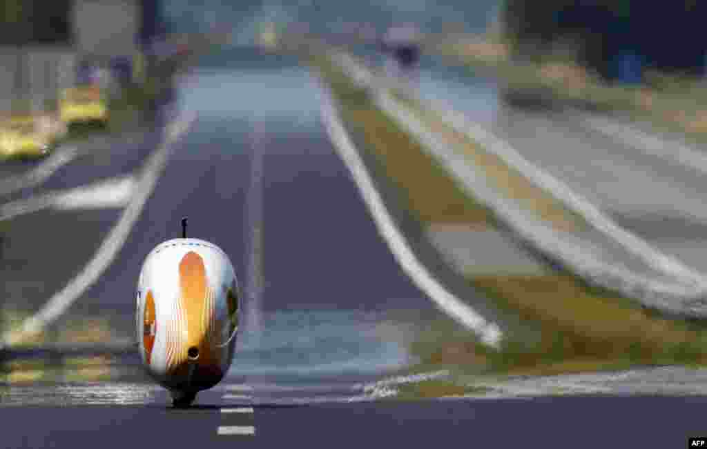 Netherlands' biker Sebastiaan Bowier takes part in a bike speed record attempt event, with his aerodynamic bike Velox3, on the A31 highway between the Dutch cities of Franeker and Dronrijp, the Netherlands. The recumbent bicycle achieved a speed of 78.8 km per hour.