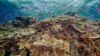 FILE - In this photo provided by the Great Barrier Reef Marine Park Authority small fish school in waters of Ribbon Reef No 10 near Cairns, Australia, Sept. 12, 2017. 
