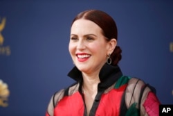 FILE - Megan Mullally arrives at the 70th Primetime Emmy Awards at the Microsoft Theater in Los Angeles, Sept. 17, 2018.
