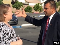 Jesse Sbaih out on the campaign trail. (K. Farabaugh/VOA)