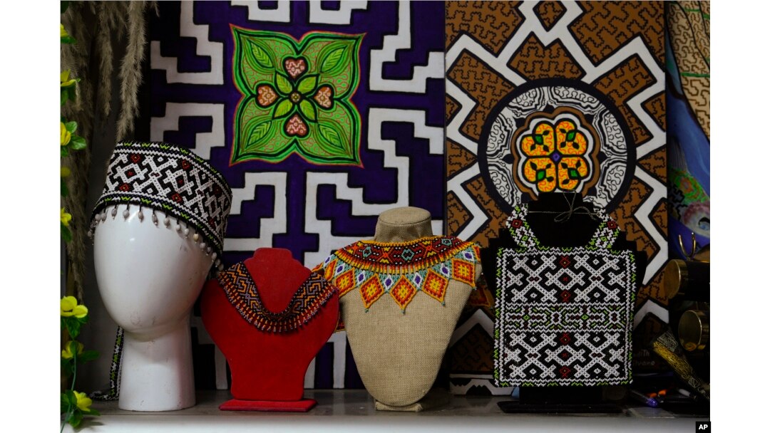 Crafts made by Sadith Silvano sit at her home and workshop in Lima, Peru, Saturday, Oct. 19, 2024. “Every design tells a story,” said Silvano, from Paoyhan, a Shipibo-Konibo Indigenous community in the Amazon. (AP Photo/Guadalupe Pardo)