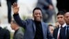 FILE PHOTO: Brazilian soccer legend Pele waves during the international friendly soccer match between Algeria and Slovenia in Algiers