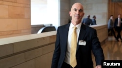 FILE - U.S. State Department Inspector General Steve Linick departs after briefing House and Senate Intelligence committees at the U.S. Capitol in Washington, Oct. 2, 2019. 