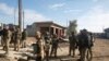 Les forces irakiennes sont sur les lieux de l'attentat à l'est de Mossoul, en Irak, le 22 décembre 2016.