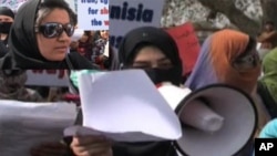 بین الاقوامی افواج کے فوری انخلا کا مطالبہ کرتے مظاہرین
