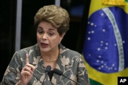 Brazil's suspended President Dilma Rousseff speaks at her own impeachment trial, in Brasilia, Brazil, Aug. 29, 2016.