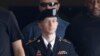 U.S. Army Private First Class Bradley Manning (C) departs the courthouse at Ft. Meade, Maryland, July 30, 2013.