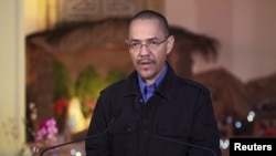 Menteri Penerangan Venezuela Ernesto Villegas di Caracas rmembacakan pernyataan terkait kesehatan Presiden Hugo Chavez pasca pembedahan di Kuba (Foto: dok).