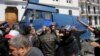Police officers disperse people protesting after parliament appointed upper house chairman Abdelkader Bensalah as interim president following the resignation of Abdelaziz Bouteflika in Algiers, Algeria, April 9, 2019. 