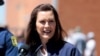 FILE - Michigan Governor Gretchen Whitmer addresses the media in downtown Midland, Michigan, May 20, 2020.