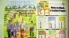 Kenyan elections posters discussed during an IEBC politician education forum in Mombasa, Kenya, Feb. 18, 2013." (Jill Craig/VOA)