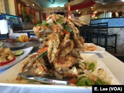 The salt and pepper crab is one of the popular dishes on the menu at the Houston-based restaurant, Crawfish & Noodles, which specializes in Vietnamese-Cajun styled seafood.