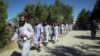 FILE - Prisoners are released from Bagram Prison in Parwan province, Afghanistan, May 26, 2020.