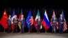 Secretary Kerry poses for a group photo with fellow EU, P5+1 foreign ministers and Iranian Foreign Minister Zarif after reaching Iran nuclear deal, in Vienna, Austria, July 14, 2015.
