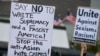 Activists demonstrate against violence towards women and Asians following the Georgia spa shootings on March 18, 2021, in Atlanta, Georgia.